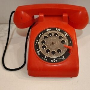 Vintage Childs Red Telephone moving dial